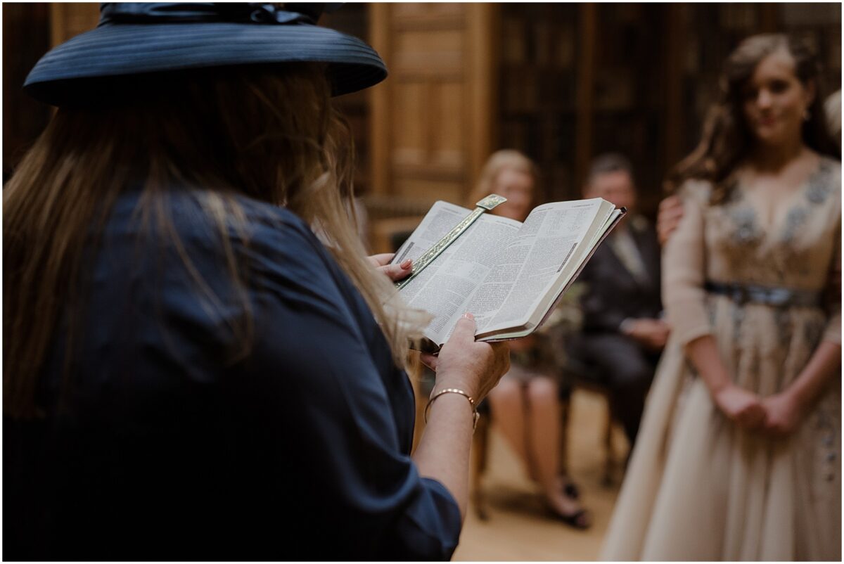Mother of the bride doing a reading from the Bible