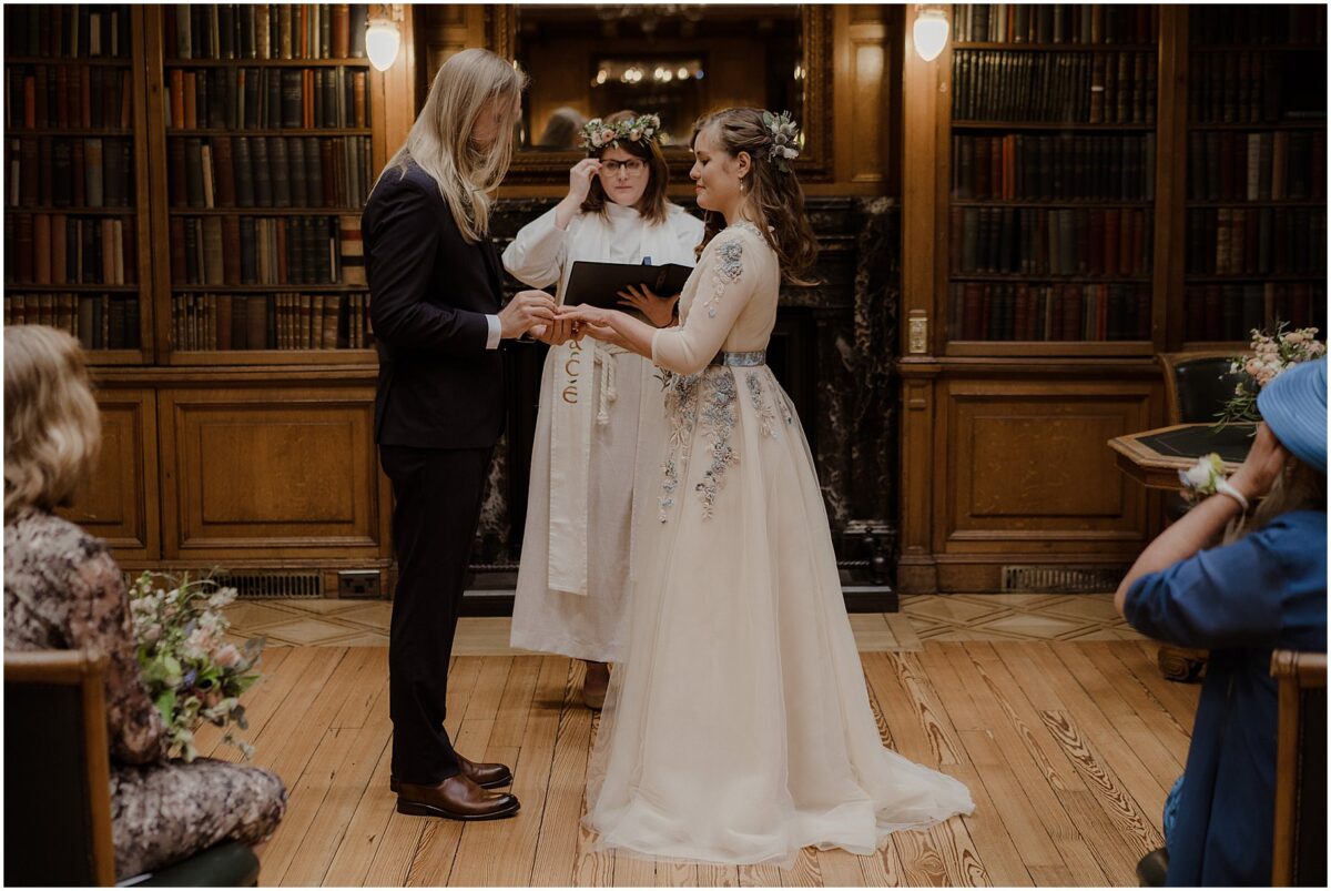 Bride and groom preparing to exchange their wedding rings