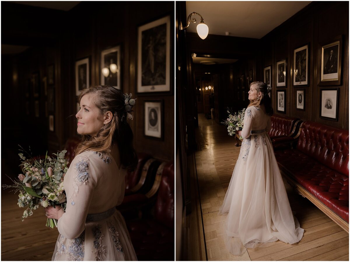 Bridal portraits by the window - bride wearing a stunning Teuta Matoshi dress and holding flowers in her hands