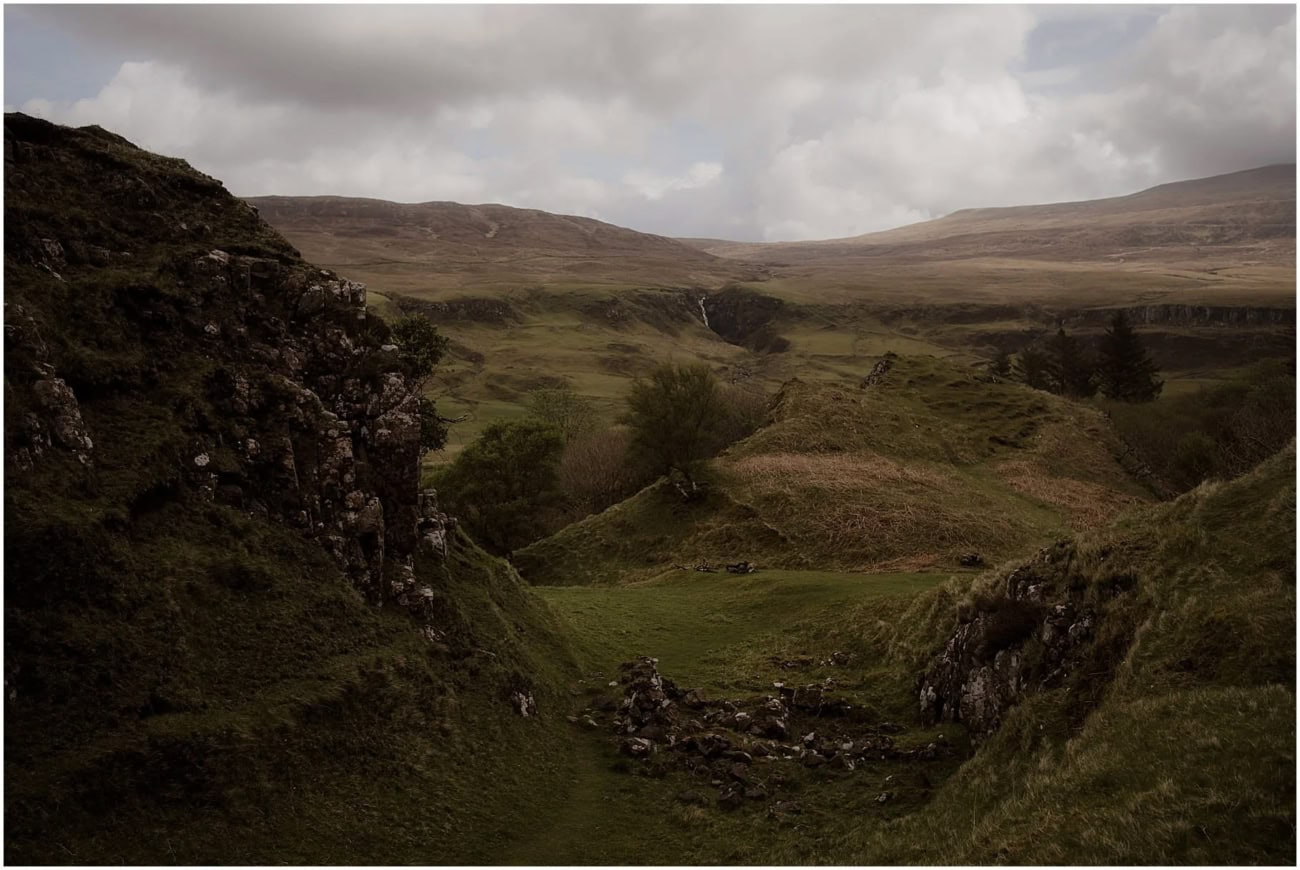 Isle of Skye elopement in Fairy Glen - Isle of Skye wedding photographer The rolling green valley and rocky gorge at Fairy Glen, Isle of Skye, on an overcast spring morning
