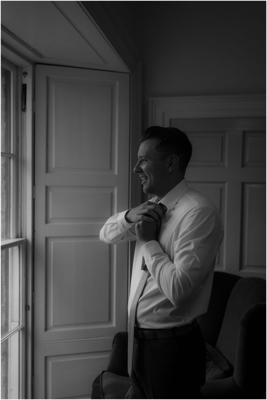 Groom portraits - getting ready photos at Edinburgh accommodation
