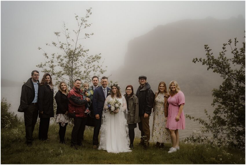 Misty outdoor wedding ceremony at Dunsapie Loch in Edinburgh, Scotland