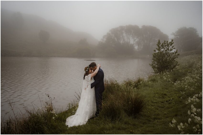 Misty outdoor wedding ceremony at Dunsapie Loch in Edinburgh, Scotland