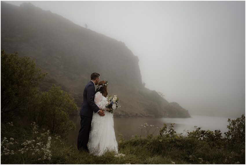 Misty outdoor wedding ceremony at Dunsapie Loch in Edinburgh, Scotland