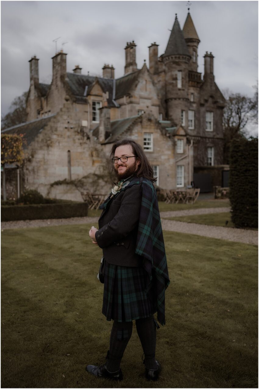 Wedding photoshoot of groom at a Castle in Scotland