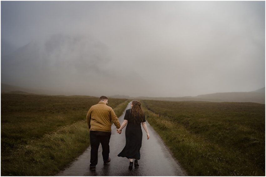 Couple walking on a road in Glencoe