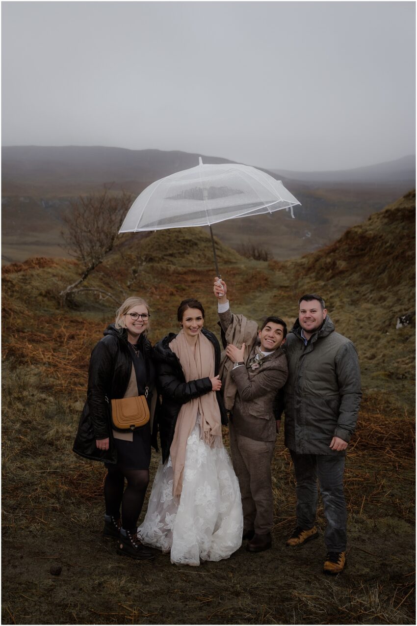 Bride and groom and their witnesses among the hills of Fairy Glen on Isle of Skye - Isle of Skye elopement photographer