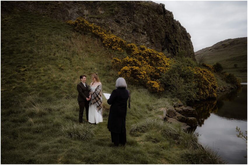 Same-sex outdoor elopement in Holyrood Park in Scotland