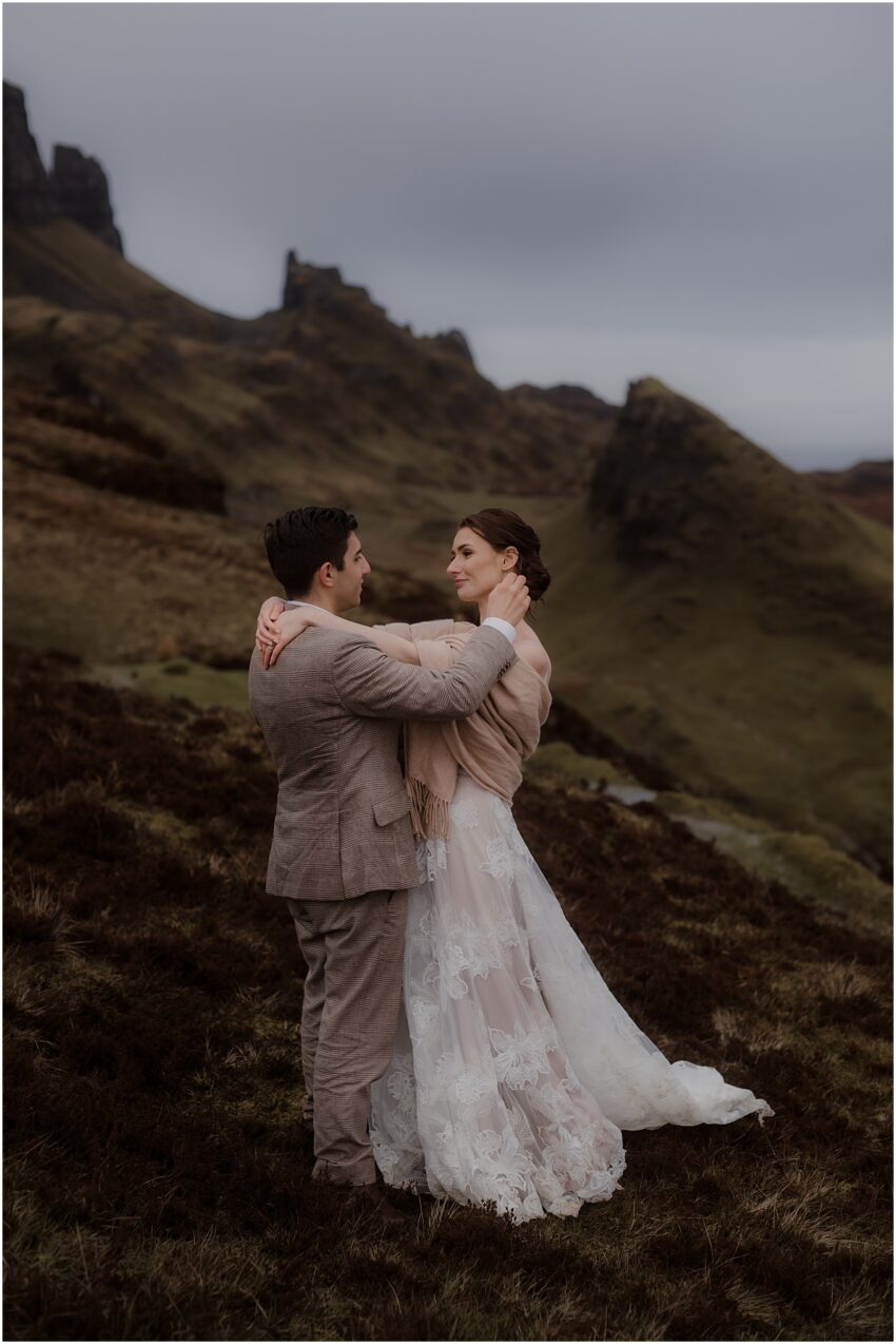 Bride and groom embracing at their  Quiraing Isle of Skye elopement - Quiraing wedding photos