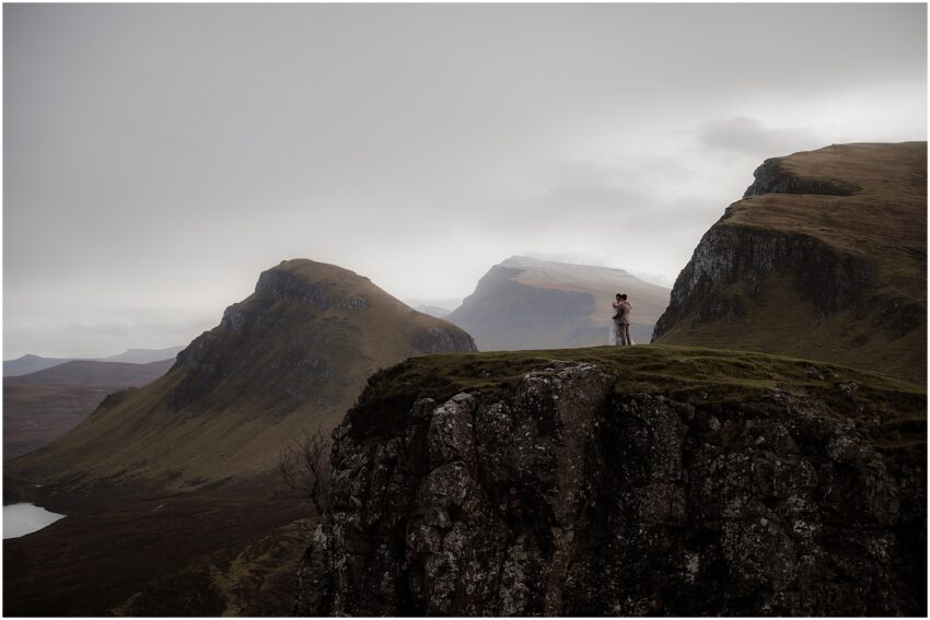 Bride and groom hugging on the hill of Quiraing - Isle of Skye elopement photographer