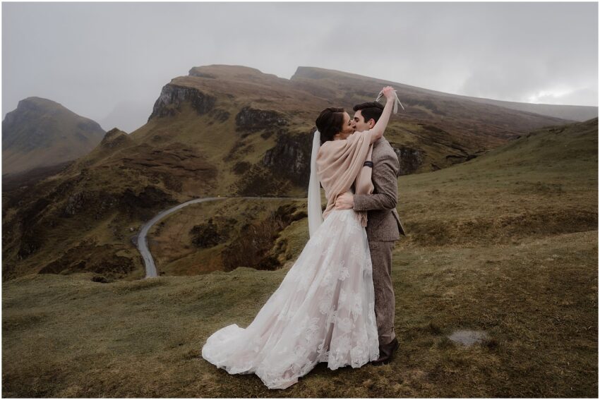 Bride and grooms' first kiss after the elopement ceremony in Quiraing