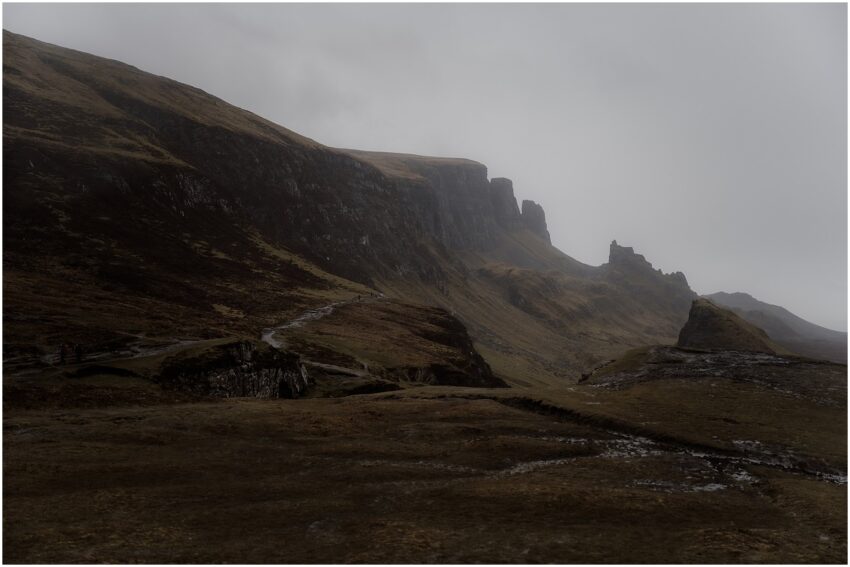 Moody and dramatic landscape of Quiraing on Isle of Skye in the rain