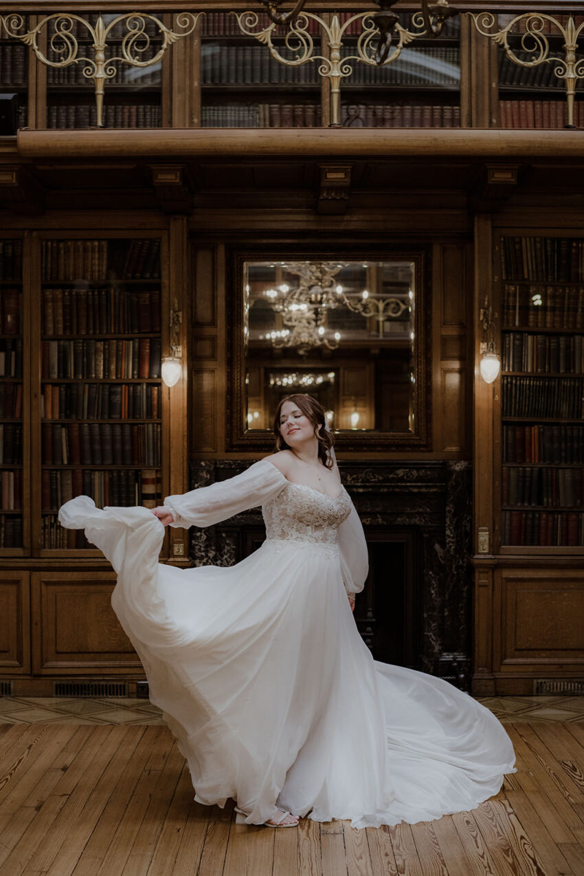 Bride twirling her dress at Royal College of Physicians in Scotland