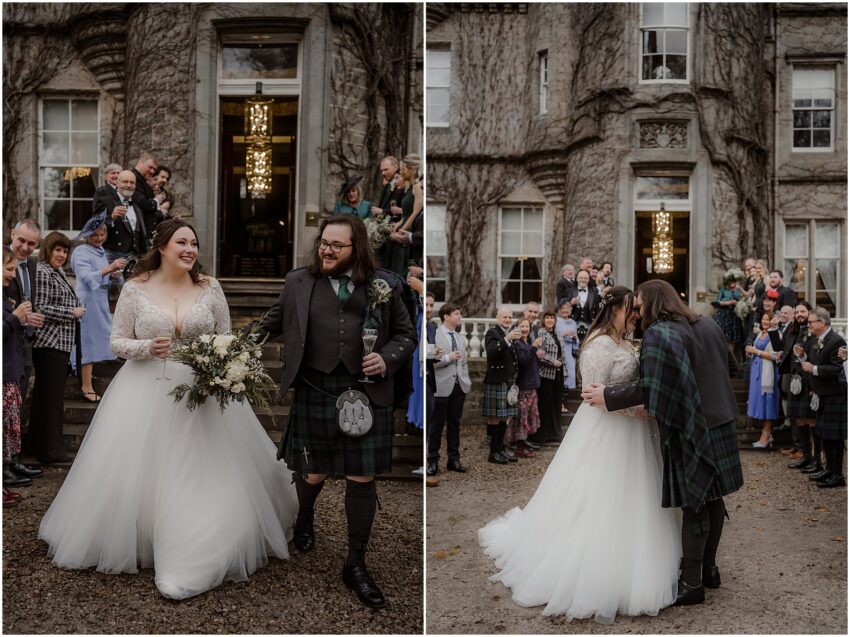 Bride and groom in front of Carlowrie Castle in Scotland