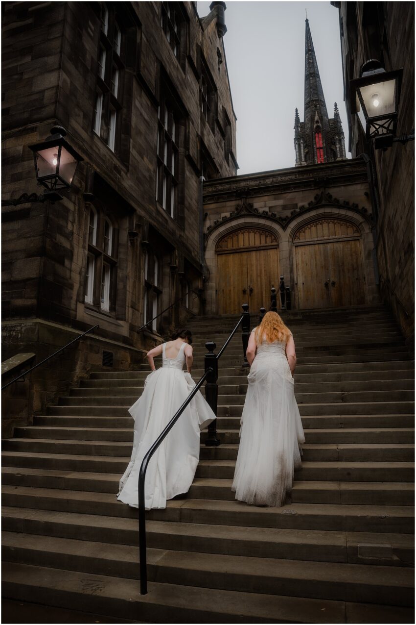 Brides climbing the steps of Assembly Rooms at Divinity College