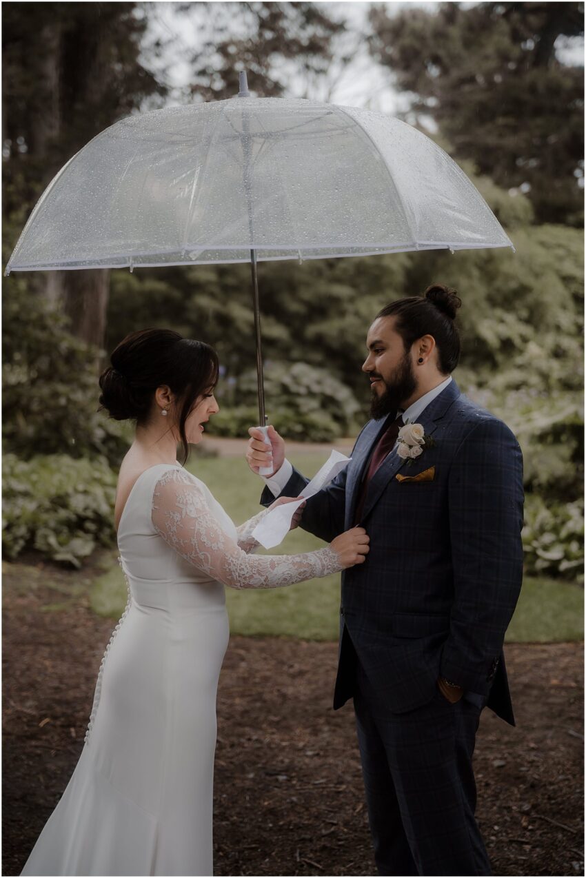 Bride and groom exchanging personal vows at the John Muir Grove elopement ceremony