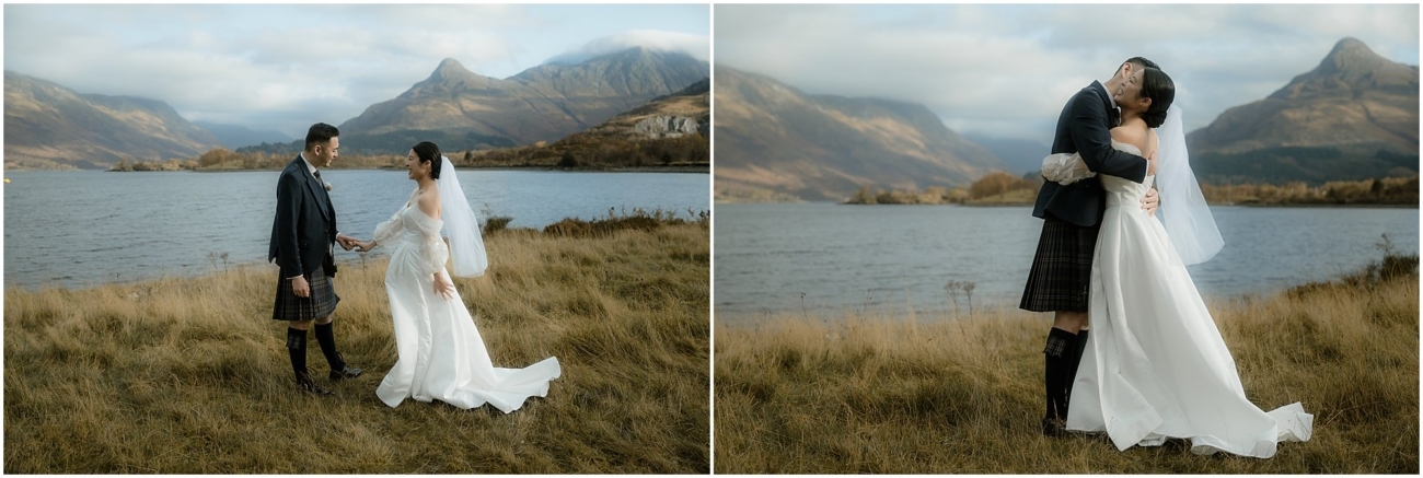 Newlyweds sharing a joyful moment after the reveal by a scenic loch with towering mountains behind them