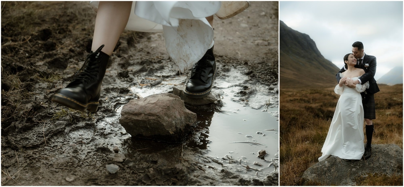 A close-up of the bride's black boots stepping carefully on a rock in a muddy puddle, with her wedding dress slightly stained. Beside it, the groom embraces the bride from behind on a rock, both smiling