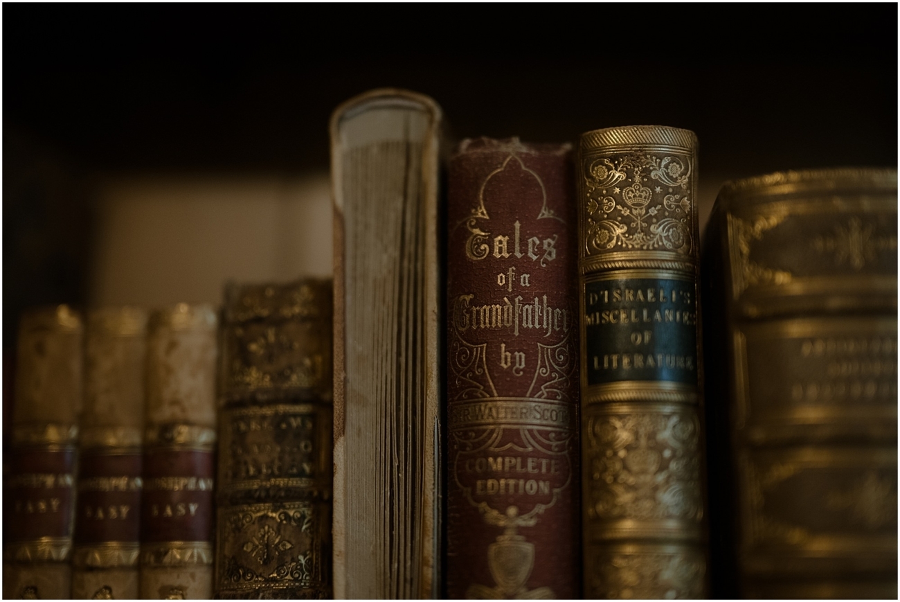 Cosy & Intimate Wedding at Ferniehirst Castle in the Scottish Borders 5 Old books in the library at Ferniehirst Castle in the Scottish Borders