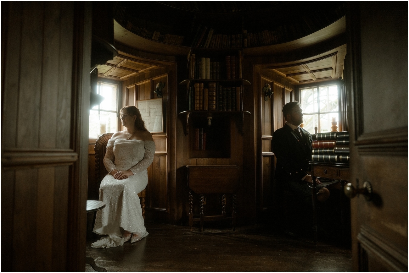 Cosy & Intimate Wedding at Ferniehirst Castle in the Scottish Borders 18 Bride and groom at the castle library