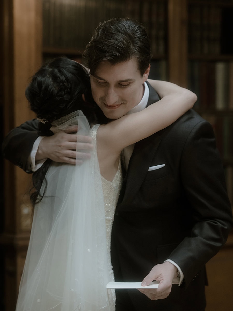 Weddings at the Royal College of Physicians Edinburgh: everything you need to know 9 Groom embracing bride after personal vow exchange
